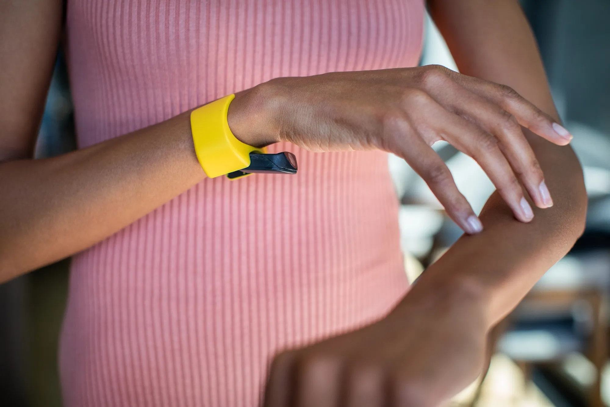 Tap XR on a wrist next to a VR headset